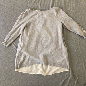 Shirt with a cut on the back.